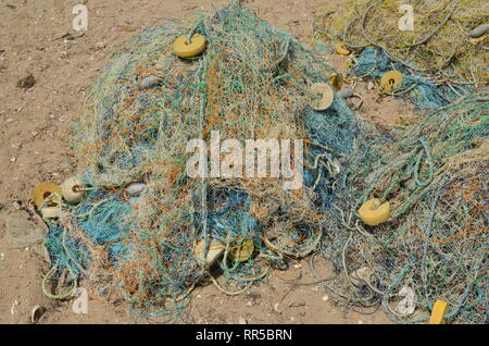 Nylon monofilament fishing net in a box on the beach, Kent, UK Stock Photo  - Alamy