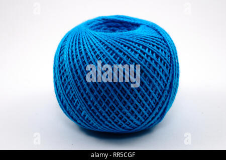 a skein of blue wool on a white background Stock Photo