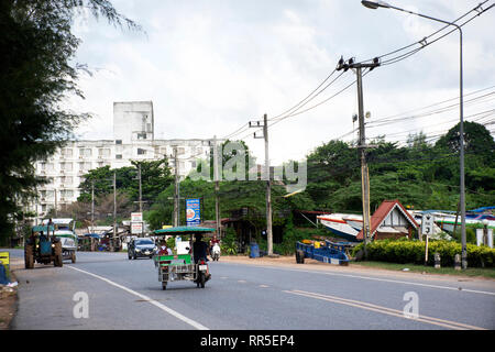 Thai people riding and driving on the road at Ban Phe village city on July 4, 2018 in Rayong, Thailand Stock Photo