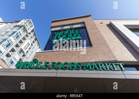 OTTAWA, CANADA - NOVEMBER 12, 2018:  Whole Foods Market logo on their main store for Ottawa, Ontario.  Whole Foods market is an American brand of supe Stock Photo