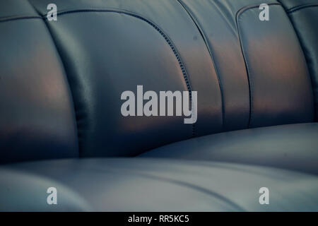 Dark blue leather fabric sofa, close up detail texture Stock Photo