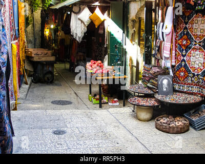 Jerusalem, Israel - May 23, 2013: City of Jerusalem, Jerusalem Market food and rag shops Stock Photo