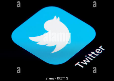 A close-up shot of the Twitter app icon, as seen on the screen of a smart phone (Editorial use only) Stock Photo
