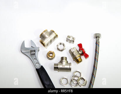 plumbing tools and equipment top view on white background. Stock Photo