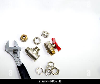 plumbing tools and equipment top view on white background. Stock Photo