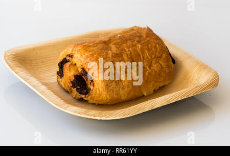 Pian Au Chocolat on a palm leaf biodegradable plate Stock Photo