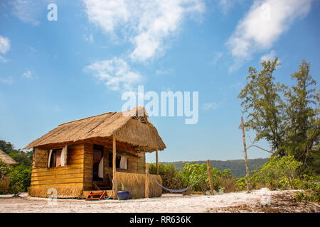 Luxury wood and bamboo constructed beach hut on white sand paradise beach location. Stock Photo