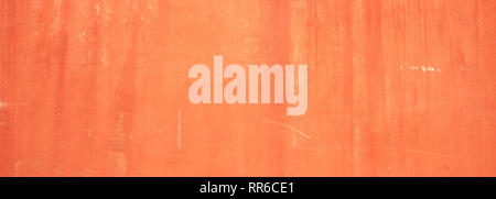 Stucco painted wall texture background, orange color, italian style, banner Stock Photo