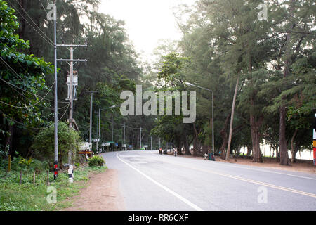 Thai people riding and driving on the road at Ban Phe village city on July 4, 2018 in Rayong, Thailand Stock Photo