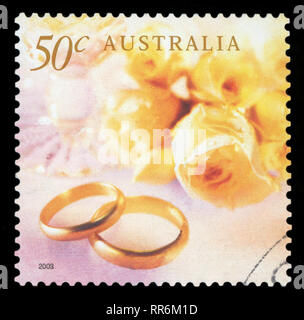 AUSTRALIA - CIRCA 2003: A Stamp printed in AUSTRALIA shows the Image for the Wedding rings with the yellow roses, Wedding series, circa 2003 Stock Photo