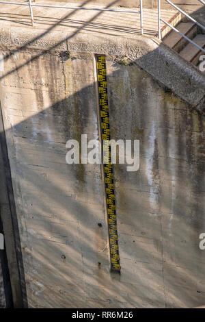 Water level meter for high water - Measuring rod Stock Photo