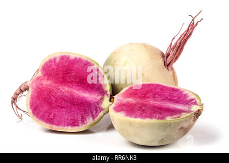 One whole and sliced watermelon radish isolated on white background Stock Photo