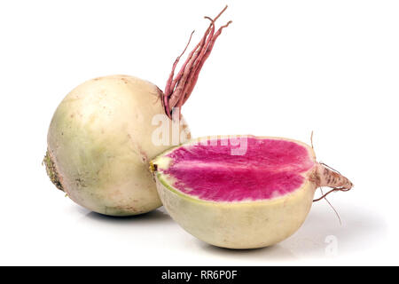 One whole and sliced watermelon radish isolated on white background Stock Photo