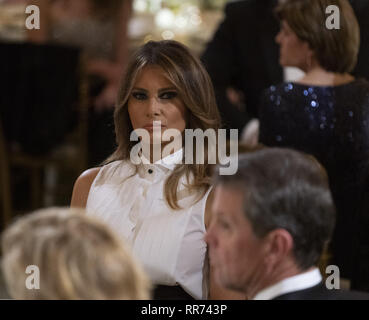 Washington, District of Columbia, USA. 24th Feb, 2019. First lady Melania Trump attends the 2019 Governors' Ball in the State Dining Room at the White House in Washington, DC on Sunday, February 24, 2019 Credit: Chris Kleponis/CNP/ZUMA Wire/Alamy Live News Stock Photo