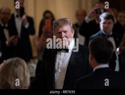Washington DC, USA. 24th Feb, 2019. United States President Donald J. Trump arrives at the 2019 Governors' Ball in the State Dining Room at the White House in Washington, DC on Sunday, February 24, 2019. Credit: Chris Kleponis/Pool via CNP/MediaPunch Credit: MediaPunch Inc/Alamy Live News Stock Photo