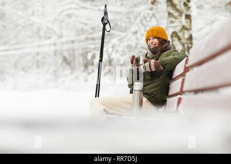 Woman in Winter Park Stock Photo