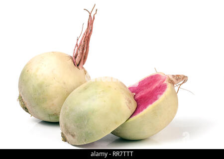 One whole and sliced watermelon radish isolated on white background Stock Photo