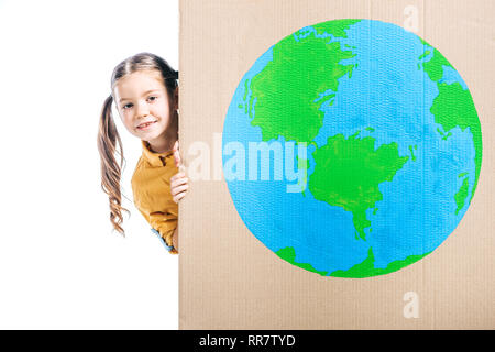 cute kid holding cardboard placard with globe sign isolated on white, earth day concept Stock Photo