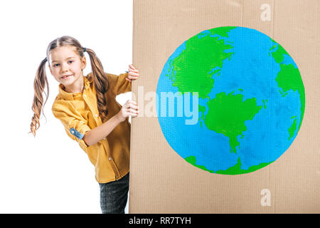 cute child holding cardboard placard with globe sign isolated on white, earth day concept Stock Photo