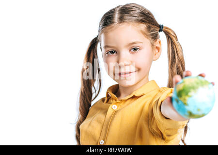 selective focus of adorable kid holding globe model in stretched hand isolated on white, earth day concept Stock Photo