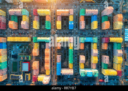 Aerial view of the colorful buildings in european city at sunset. Cityscape with multicolored houses, cars on the street in Kiev, Ukraine. Top view. U Stock Photo