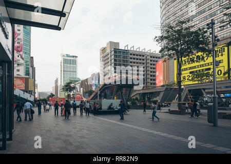 Shenzhen, China, Feb, 21, 2019: People walking at promenade at Huaqiangbei, the worlds largest electronic market Stock Photo