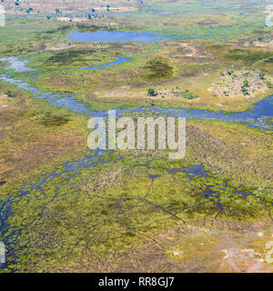 view from above on natural Okavango Delta landscape, swamps, grassland Stock Photo