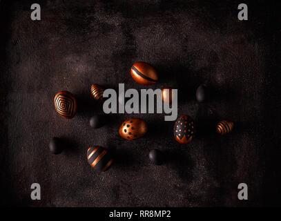 Easter background. Easter eggs in various golden designs Stock Photo