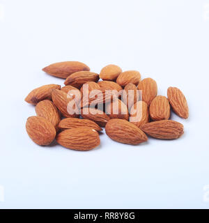 nuts almonds isolated on white background. Selective focus. Stock Photo