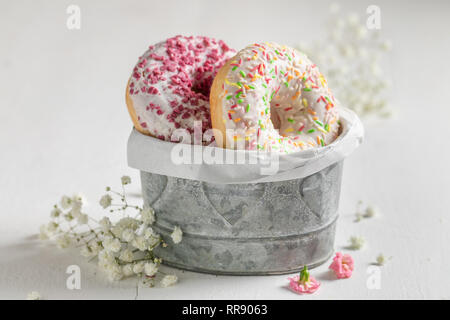 Yummy and fresh donuts with various types of toppings Stock Photo