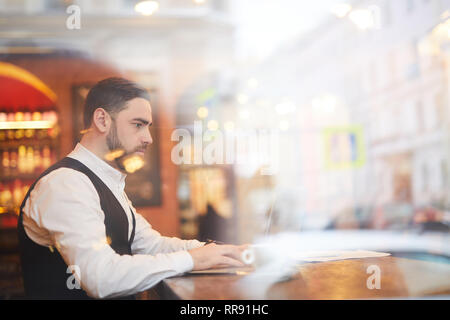 Handsome Businessman Working on Coffee Break Stock Photo