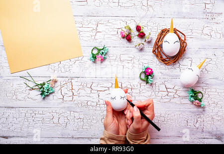 Eggs in shape of unicorn. Step by step. Stock Photo