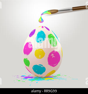 Hand painted multicolored Easter egg and paintbrush. Realistic illustration. Stock Photo