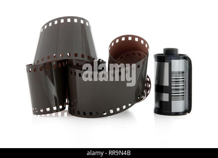 Black plastic film roll case isolated on white Stock Photo - Alamy