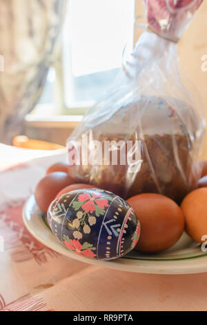 Easter egg, also known as pisanka, and Kulich cake are traditional food for Easter in the slavian countries like Russia, Ukraine or Poland Stock Photo