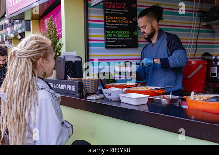 London, UK - 20, December 2018: Street food stand in Camden Lock Market or Camden Town in London, England, United Kingdom Stock Photo