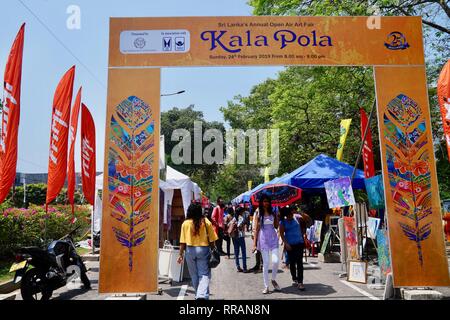 Colombo. 24th Feb, 2019. Photo taken on Feb. 24, 2019 shows the entrance of Sri Lanka's open air art fair 'Kala Pola 2019' in Colombo, capital of Sri Lanka. The event is one of Sri Lanka's largest cultural events and has attracted many tourists over the recent years. Credit: Tang Lu/Xinhua/Alamy Live News Stock Photo