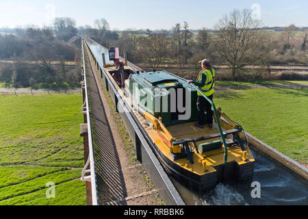 A barge travels over Edstone Aqueduct on a 4 miles length of the Stratford-upon-Avon Canal in Warwickshire. 25 February 2019.