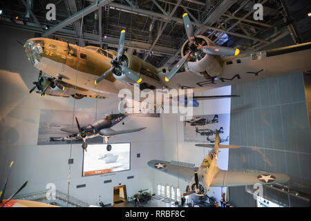 View of WWII warplanes displayed inside the National World War Two Museum in the Warehouse District of New Orleans, Louisiana, USA. Stock Photo