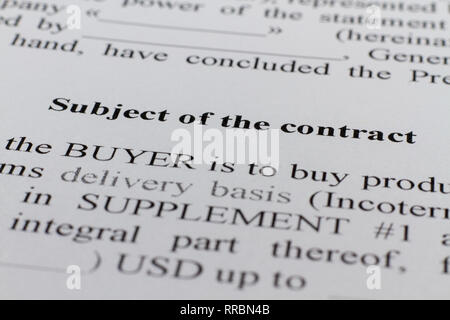 A fragment of a contract printed on paper. Section Subject of the contract. The buyer and the seller made a contract on paper. Stock Photo