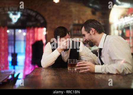 Drunk Business People in Pub Stock Photo