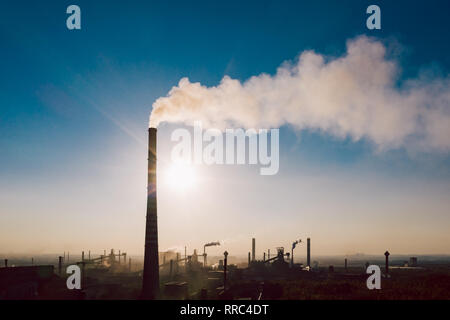 industrial landscape with heavy pollution produced by a large factory Stock Photo