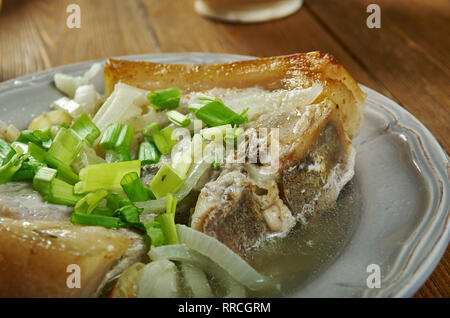 Cajun-Style Smothered Pork Chops,  Louisiana Kitchen, spicy dark roux-based grav Stock Photo