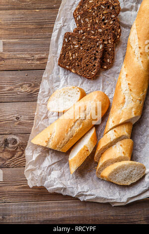 Sliced loaf with black bread Stock Photo
