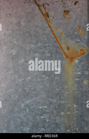 Close up of a steel sheet fence showing a spot of rust Stock Photo