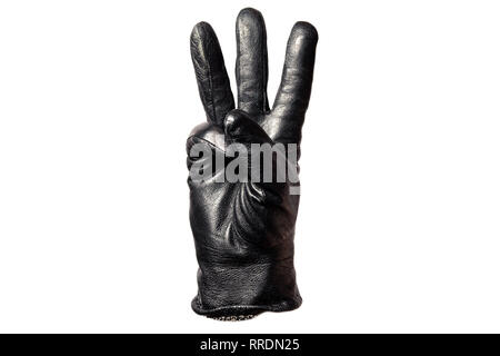 Close-up black leather glove, fingers showing number three. Isolated on white background. Concept symbols, signs, numbers Stock Photo