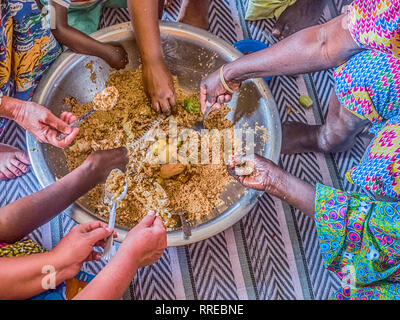 Senegal family eating together in the traditional manner. Senegal ...