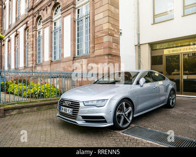 Strasbourg, France - Oct 1, 2017: Front side view of ilver luxury Audi A8 vehicle parked in an upper-class neighbourhood in Strasbourg, France in Place Broglie near city hall Stock Photo