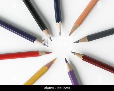 close up.colored pencils stacked in a circle on a white background Stock Photo
