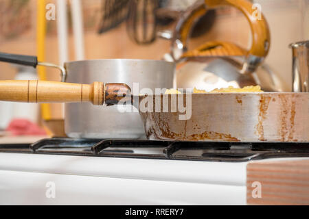 Pan on the gas stove close-up. Kitchen utensils Stock Photo